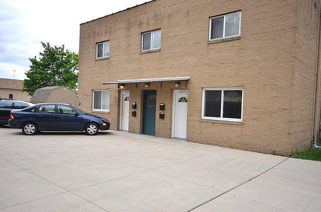 Apartment entrance is in the back of the building