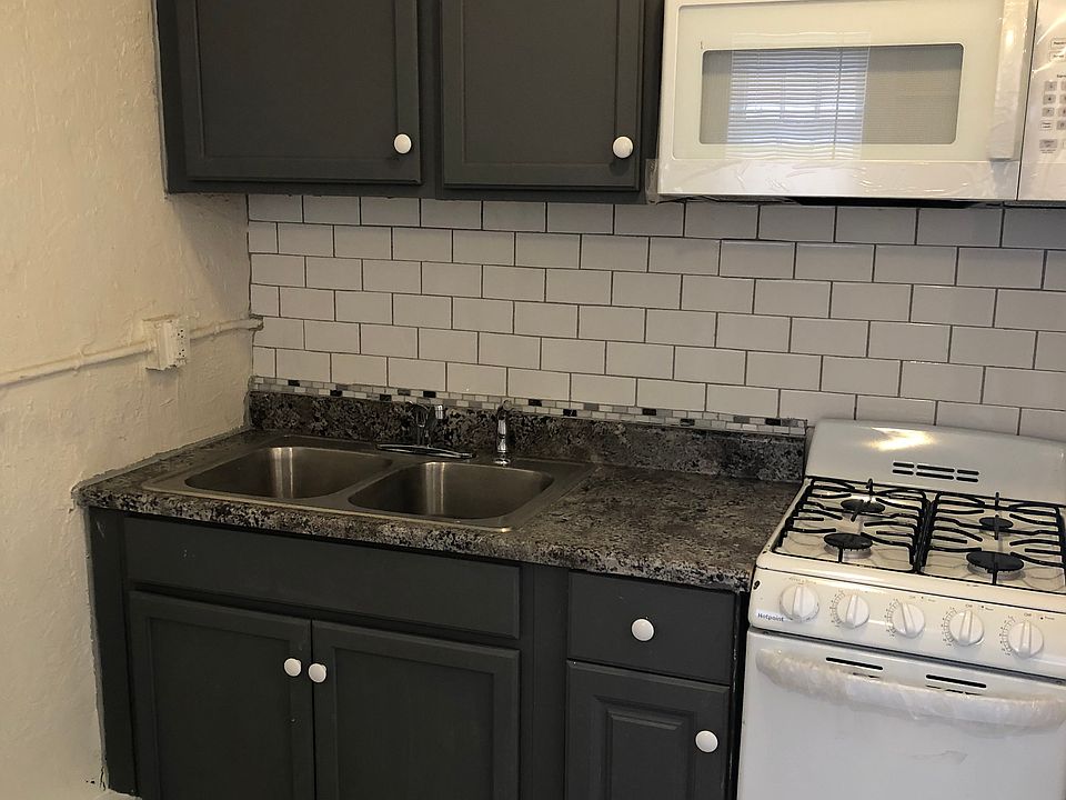 Kitchen with brand new appliances and cabinets.