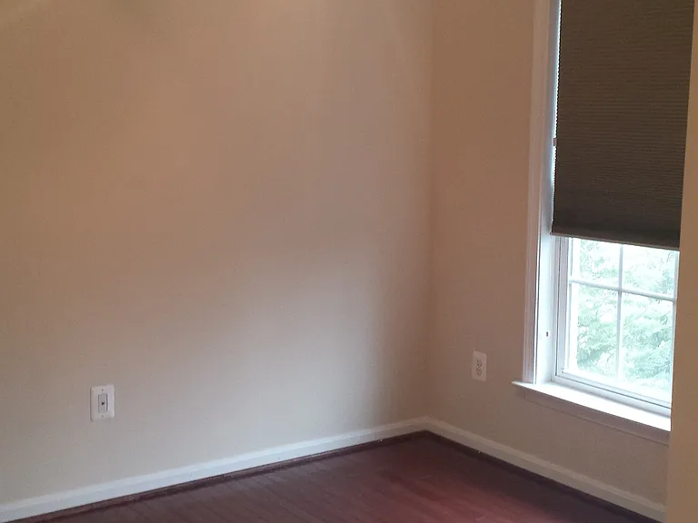 2nd Bedroom on 3rd level with ceiling fan and spacious closet.