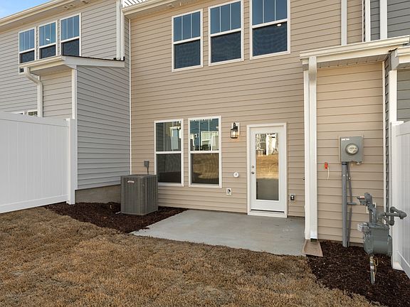 2 story townhome with large owner s suite, 2 car parking pad and patio