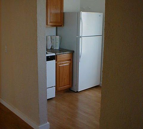 Kitchen stove and refrigerator