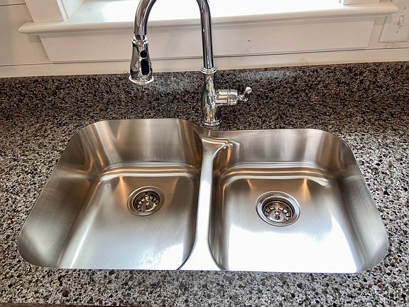 All aspects of the kitchen are well maintained. Double sink with garbage disposal.