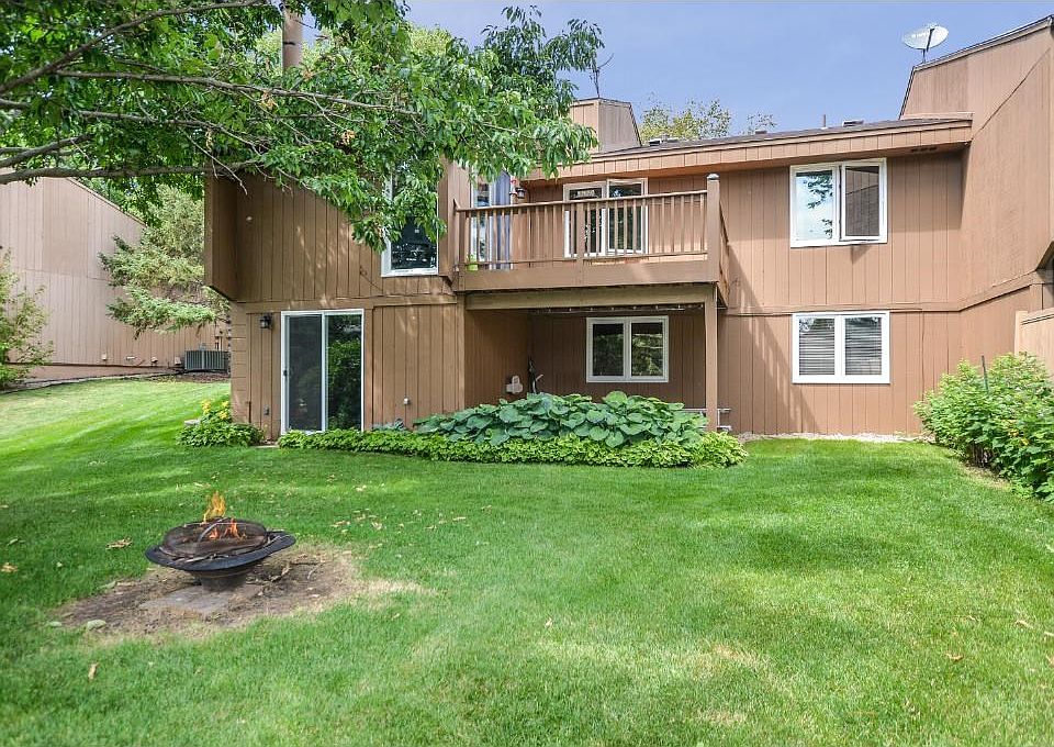 Gorgeous backyard with many gardens and large deck!