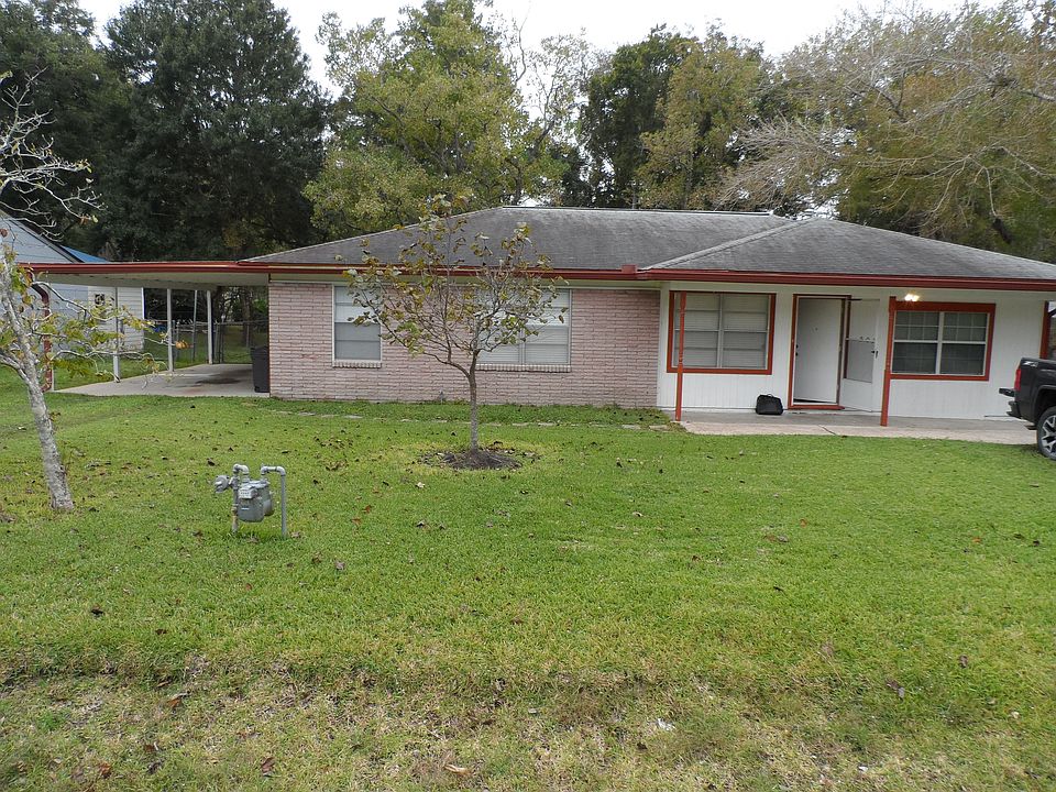 Front of house, carport