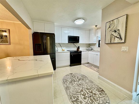 4th image of 2440 Deer Creek Country Club Boulevard #305