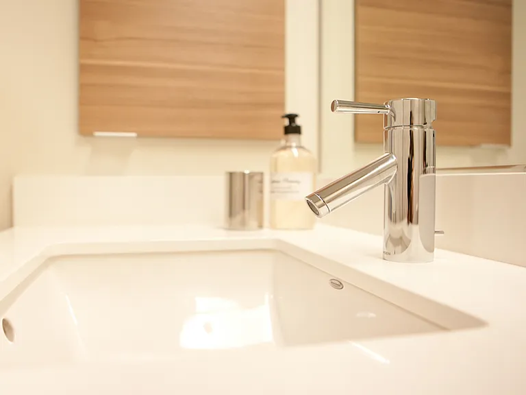 Spa-like bathroom featuring Moen premium water saving fixtures