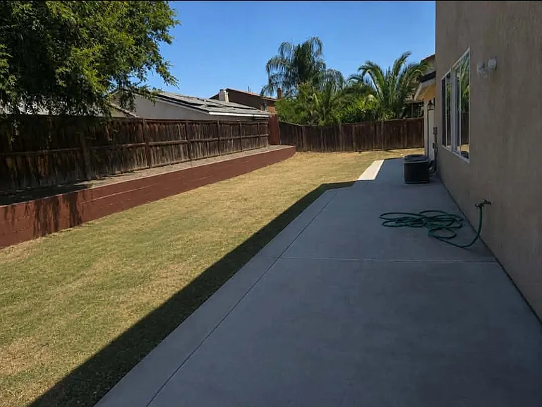 Spacious backyard with plenty of room to relax, play, and enjoy the outdoors.