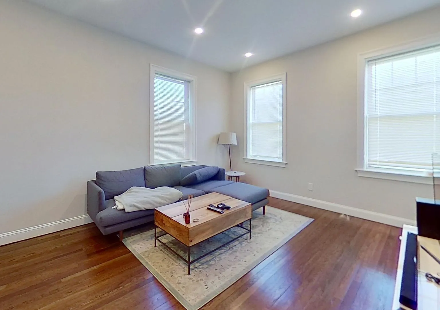 Modern 2-Bed Condo with Parking Steps from the Green Line & Boston Colleges! — Photo 2