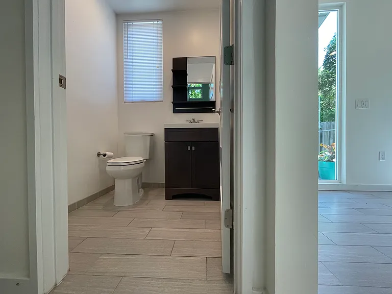 First floor 1/2 bath between the Kitchen and Living Room areas.