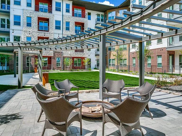 Outdoor fire pit with lounge seating