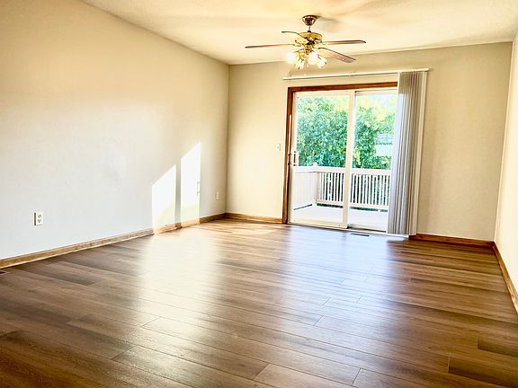 LARGE LIVING ROOM OPENS TO DECK...