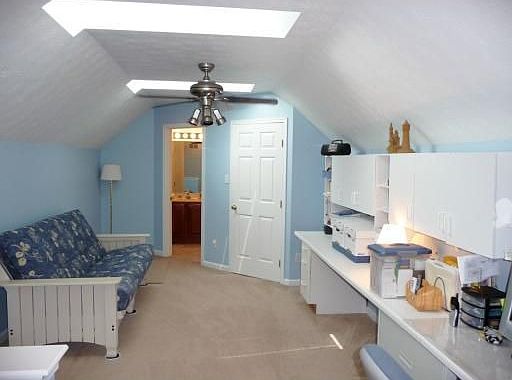 Loft w/skylights, walk-in closet, and full bath.