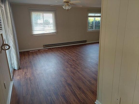 View from entry hall into Living Room.
