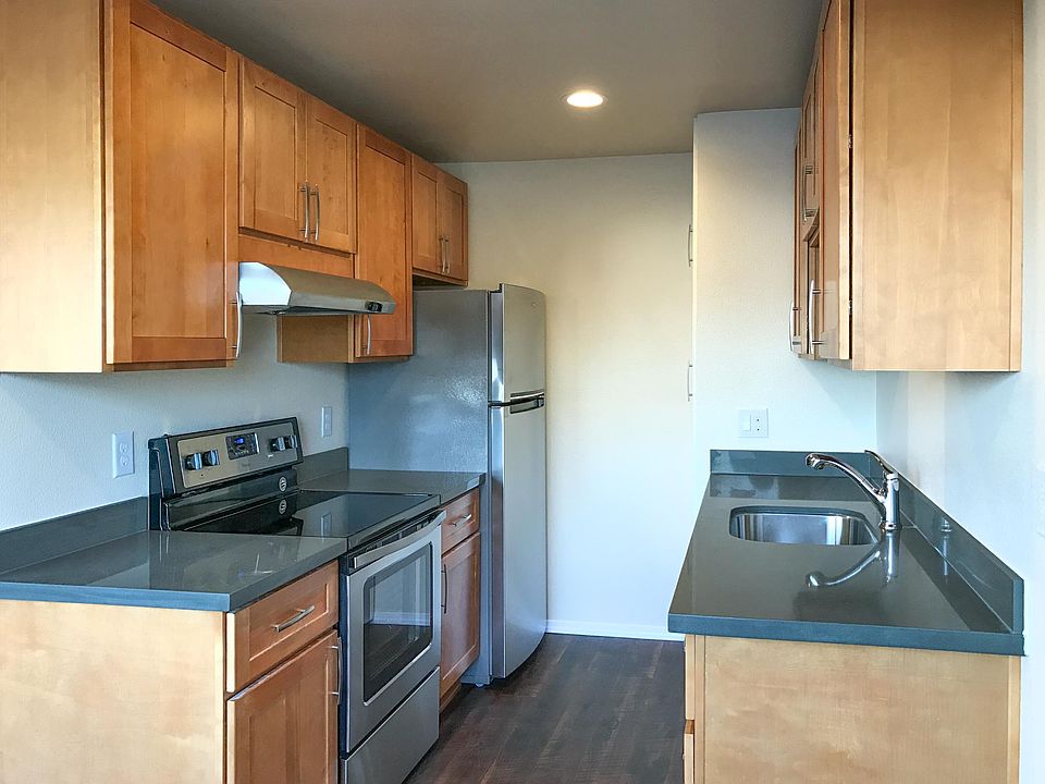 New Kitchen with Quartz countertops and Stainless appliances.