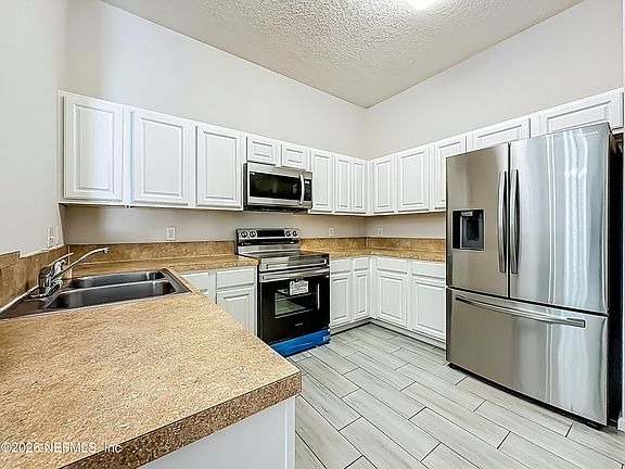 5th image of 7920 MERRILL Road #1107