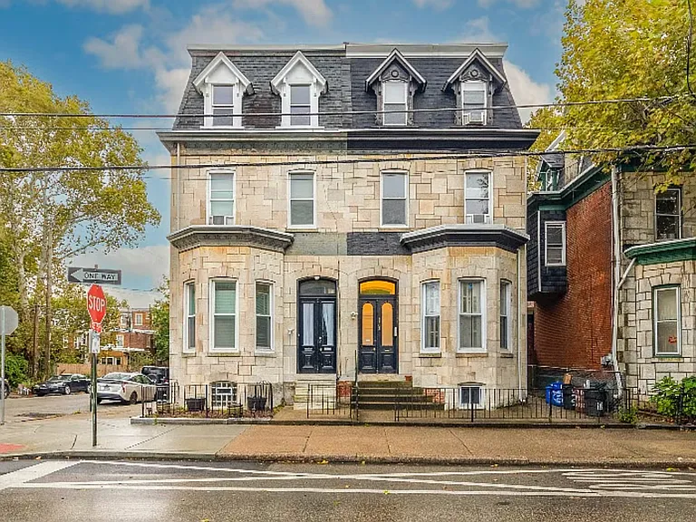 The house is on the right side of a historic twin