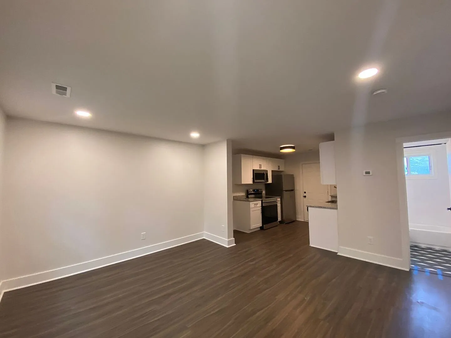 Completely Renovated / 2 Bedroom / 1 Bathroom / Onsite Parking / Private Fenced Patio / In Unit L... — Photo 3