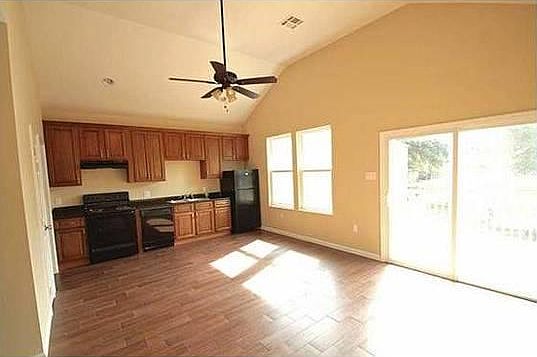 Grand Room with high ceilings and attached porch