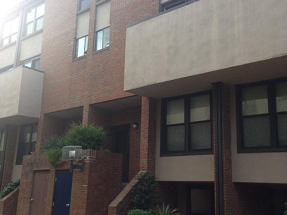 Front of unit off of Private shared driveway