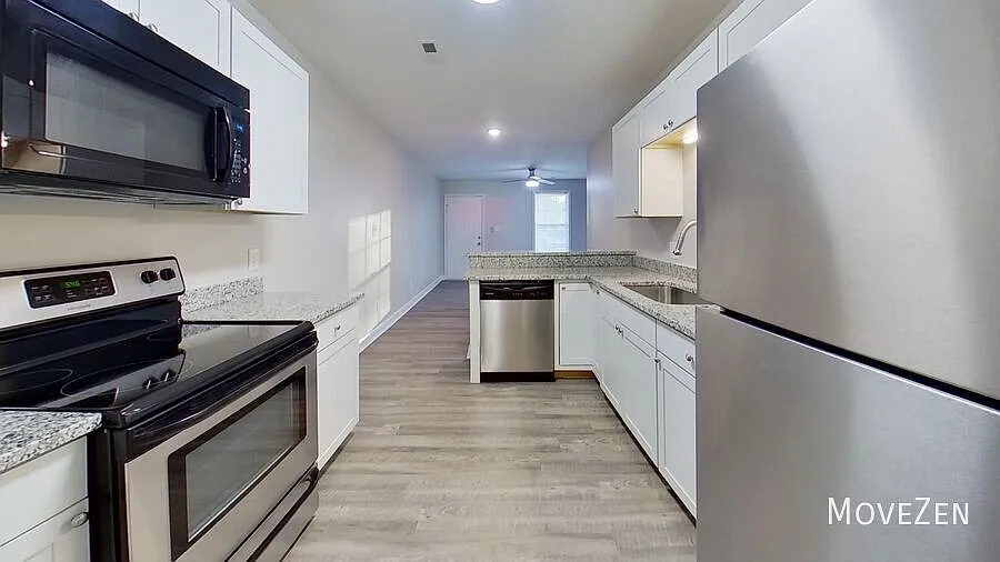1132 Norris Rd Clayton, NC 27520 Wood-look Flooring, Private Patio, Plenty of Parking — Photo 2