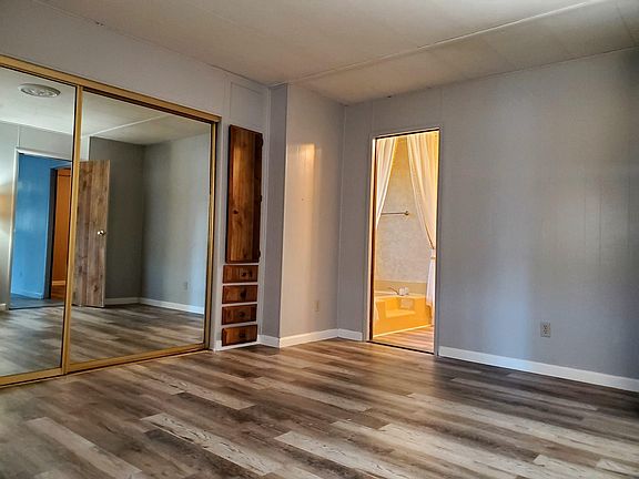 Master bedroom with large closet and built in drawers