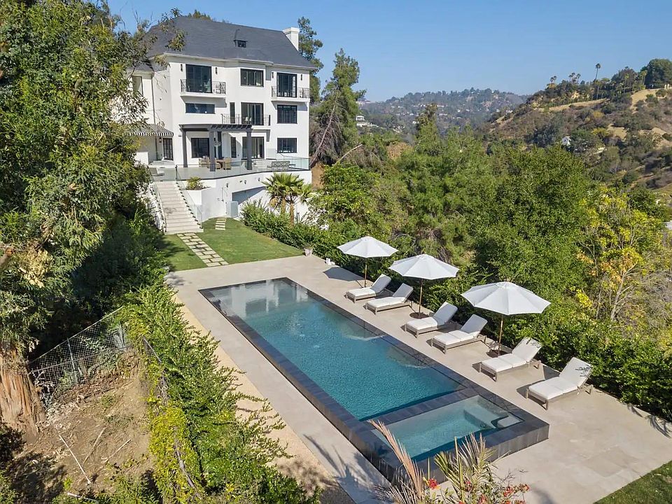 Classic and clean French architecture accents this amazing outside enjoyment area.