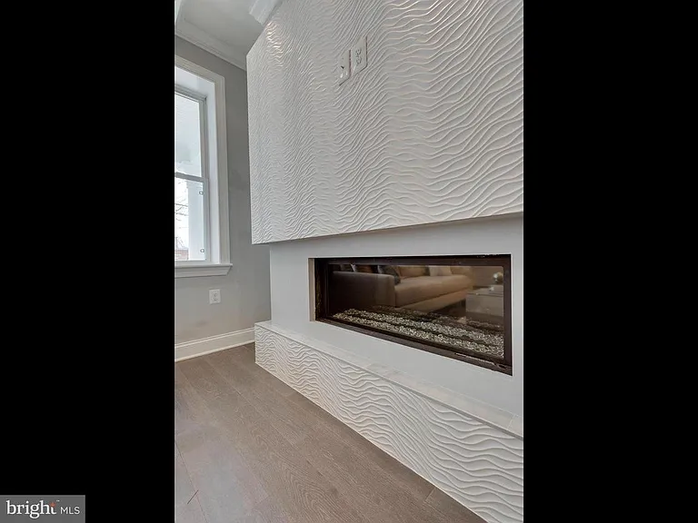 Fireplace with Ponderosa Tile. TV mount flush above