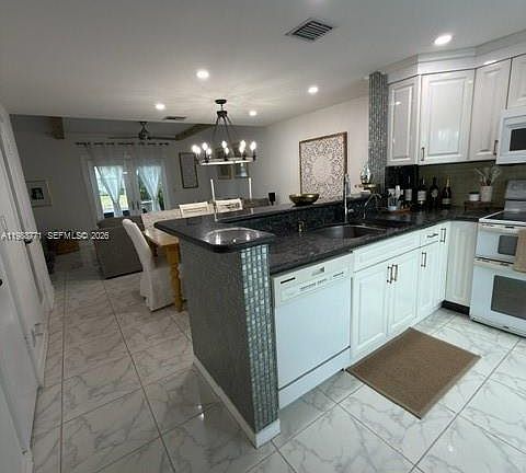 5th image of 147 SW 3rd St