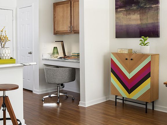 Apartment Living Room with built-in desk.