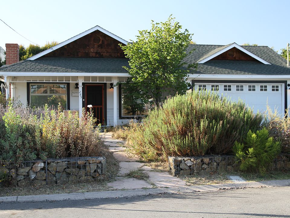 Front of house with drought tolerant native garden.