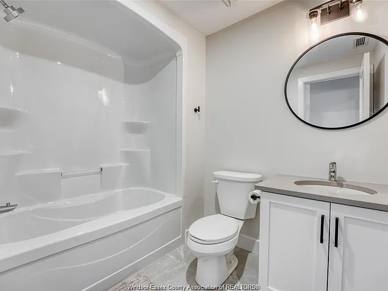 4578 Huron Church Line Rd #205 — Photo 18