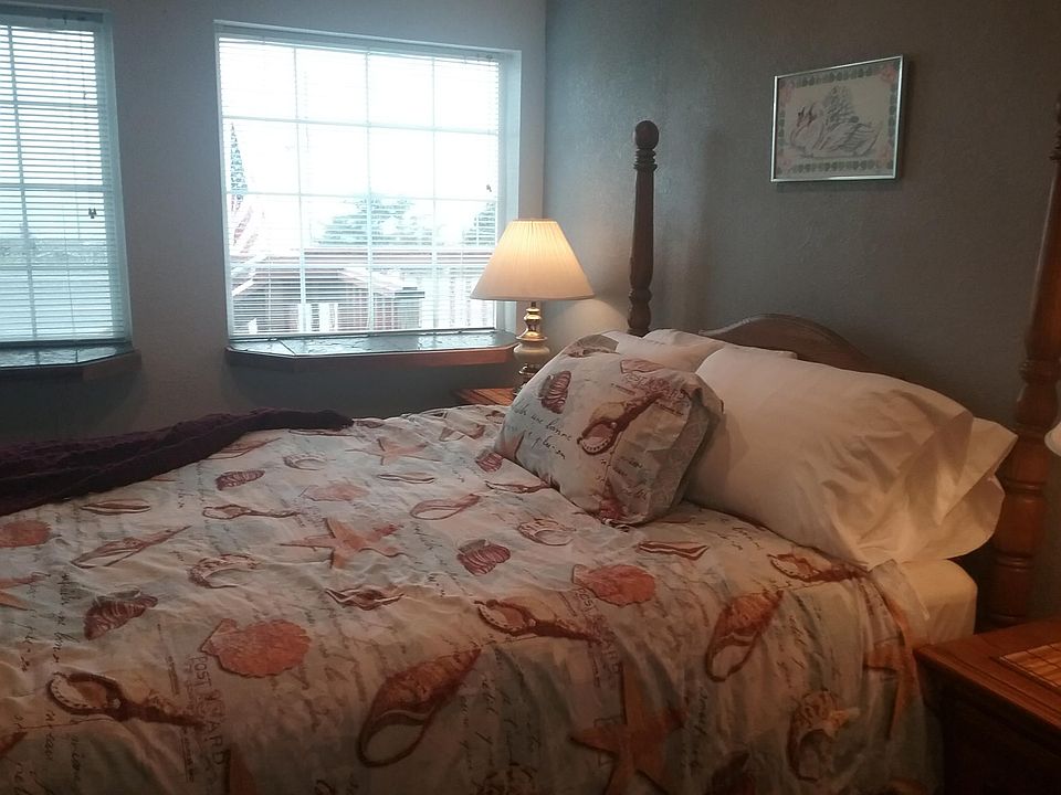Headboard is presently facing the windows.