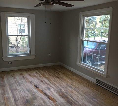 Nice living room. Floors to be refinished by October 24th!