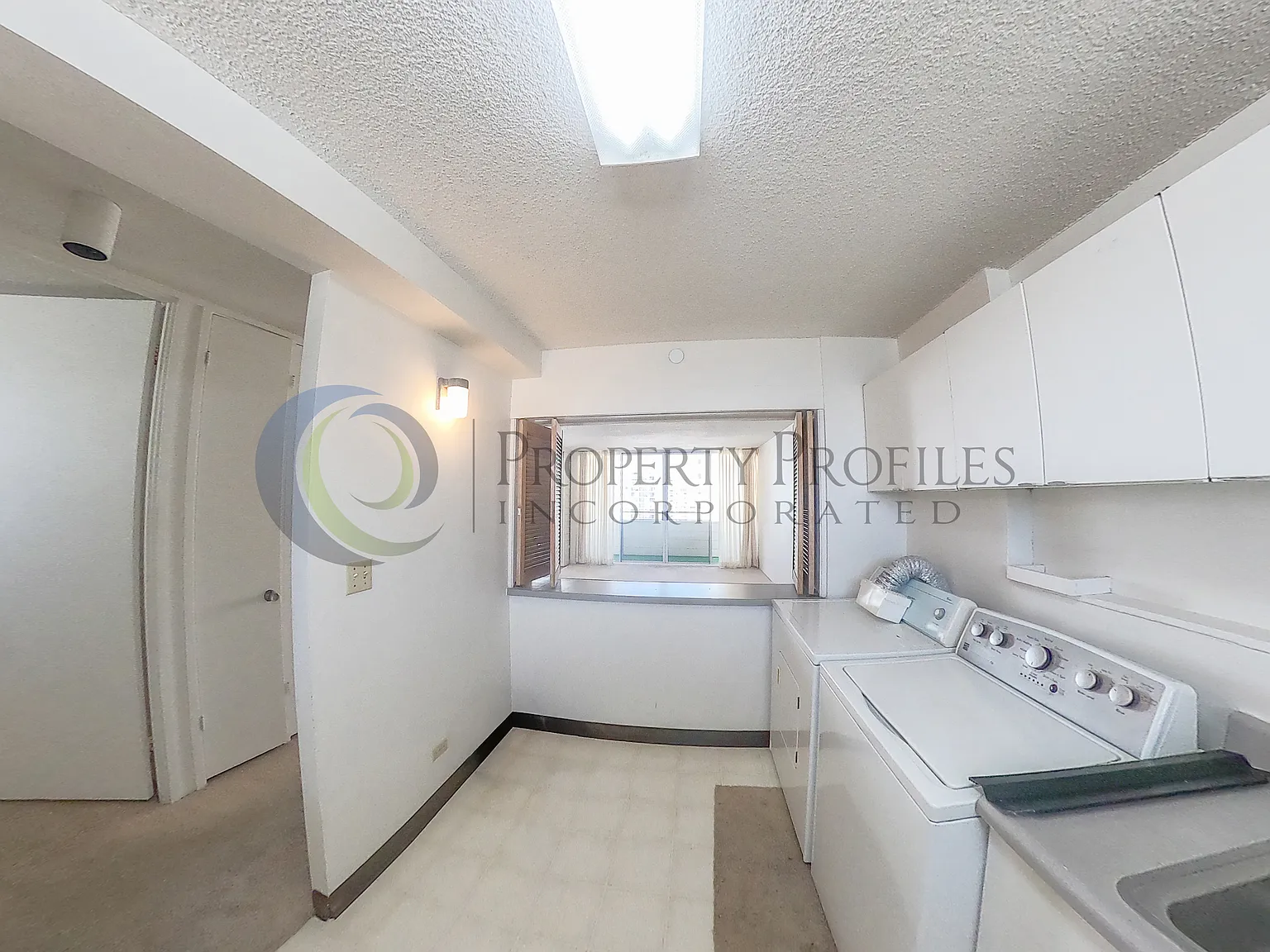 kitchen + laundry area