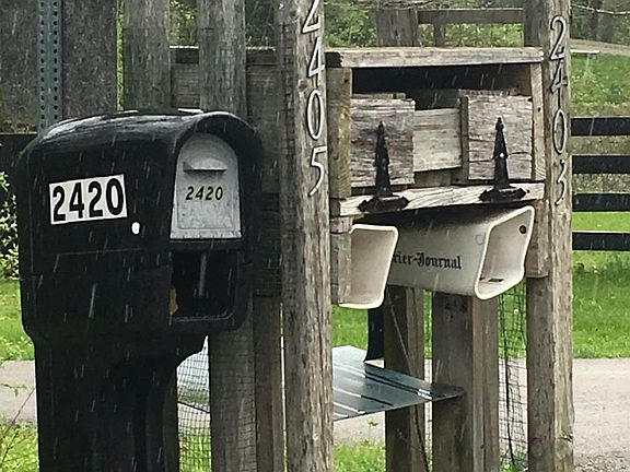 Mailboxes at street (note, 2420 mailbox is for home across the street. Driveway behind is ours.