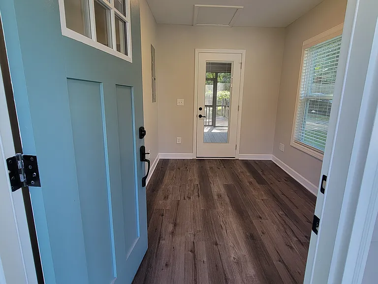 Front entry to office with access to screened-in porch.