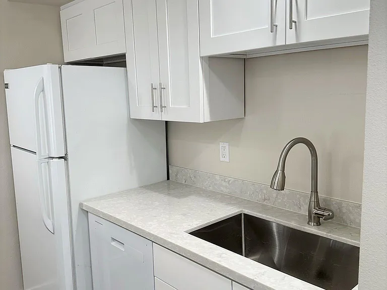 9242 Ashworth Ave N #A103 — Photo 1