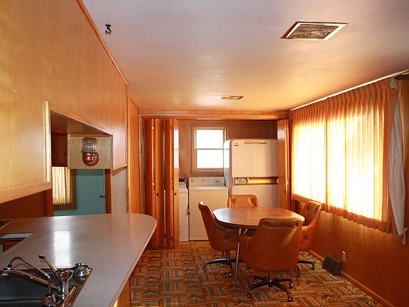 Dining/Laundry Area/Kitchen