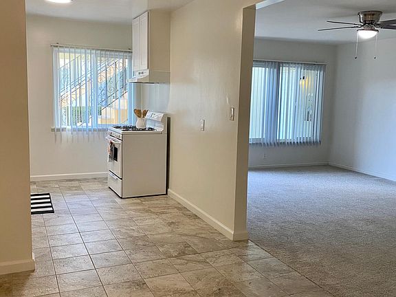 Dining room connects to living room and kitchen