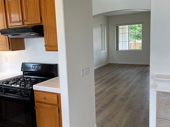 View to dining room, living room and front door from family room