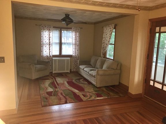 Living Room area, can fit 2 full size sofas, chair, and coffee table.