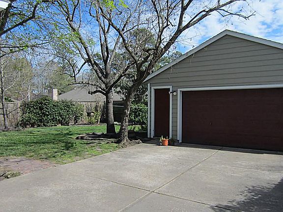 Iron gate leading to garage.