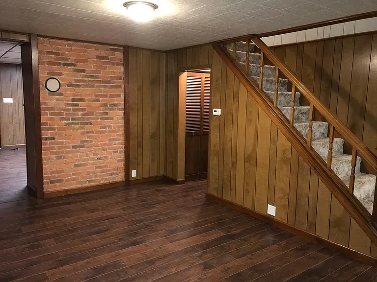 Closet tucked in the hall to the basement, big stairwell and tons of space in the Dining Room!