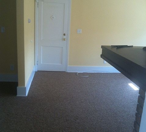 VIEW FROM SUNPORCH INTO LIVING ROOM