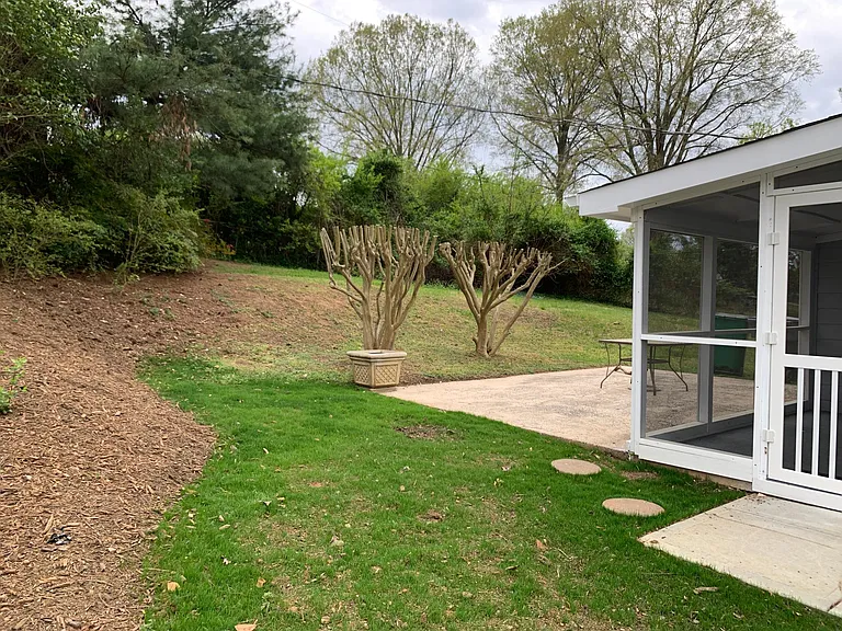 Screened porch, outdoor patio and fenced in back yard