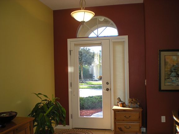 Attractive front entry with arched transom window!