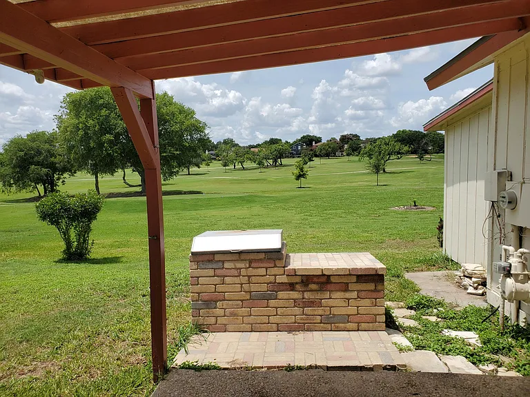 Backyard view. Direct access to Northern Hills golf course.