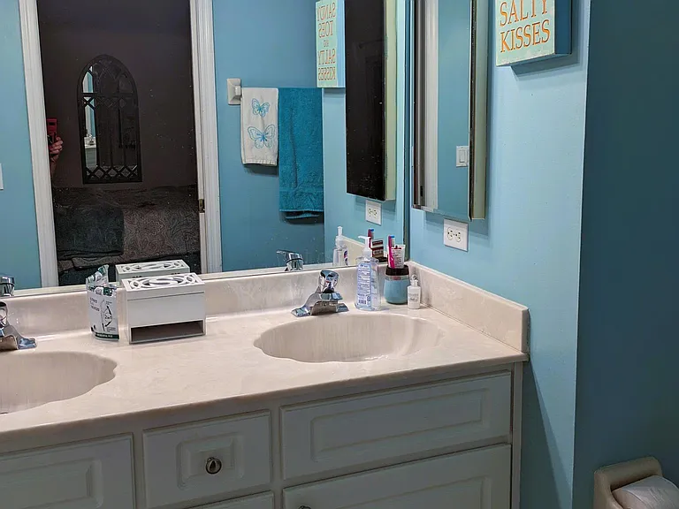 Master bathroom with double sinks + shower