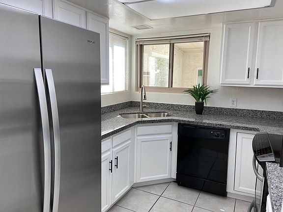 Kitchen with Granite countertop and Stainless-steel appliances