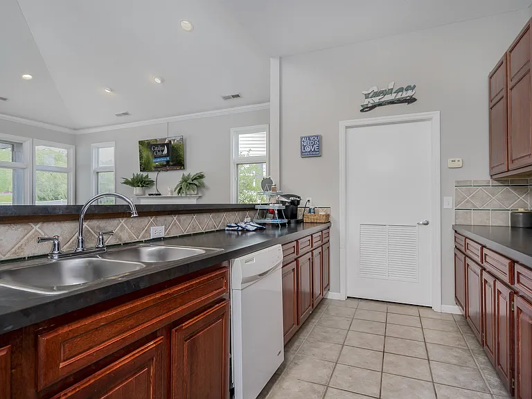 A warm, inviting kitchen designed for cooking, sharing meals, and making memories together.